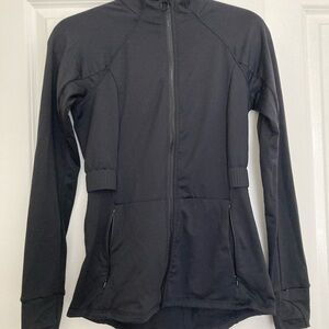Fabletics Women's black running jacket with thumb holes and vent on back